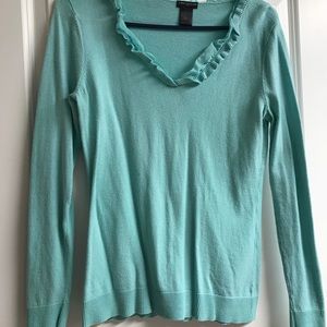 Light teal blue v-neck sweater